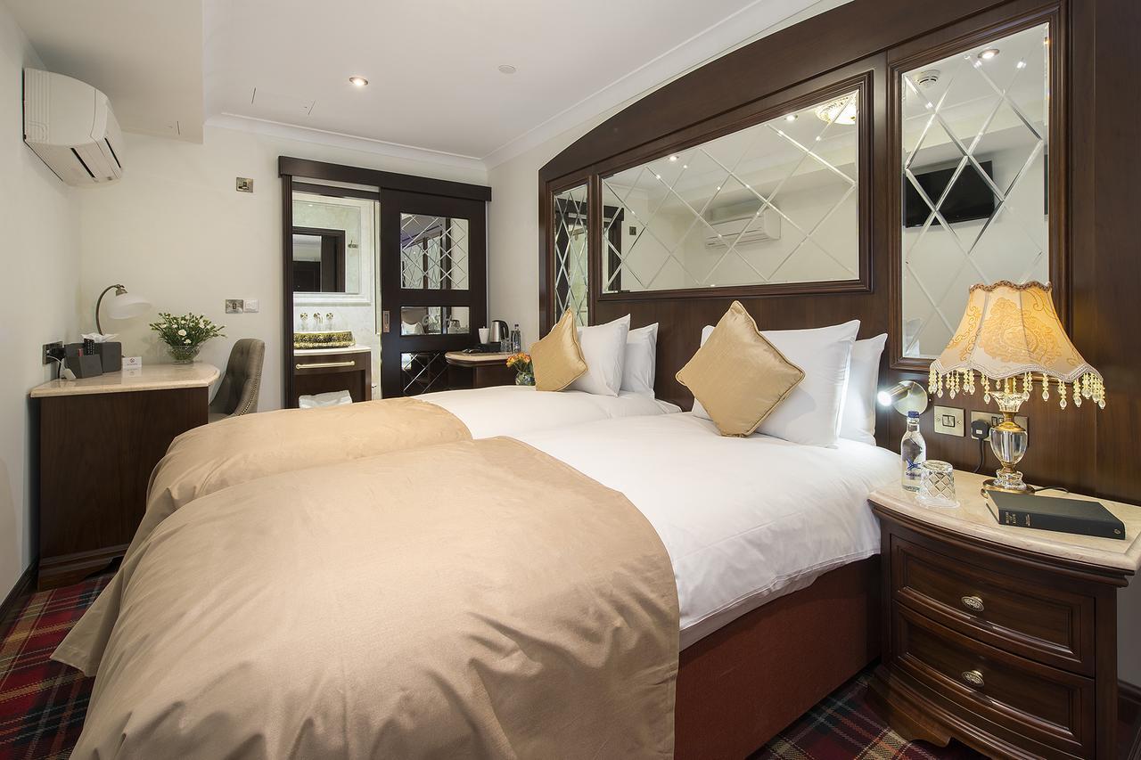 ザ ジョージ ストリート ホテル オックスフォード エクステリア 写真 A bedroom at the hotel